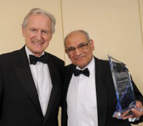 Receiving the Mayor's Award from Bob Warman of ITV for services to humanity - locally, nationally and internationally - at the 10th Annual Mayor's Civic Awards at the Bescot Stadium, Walsall